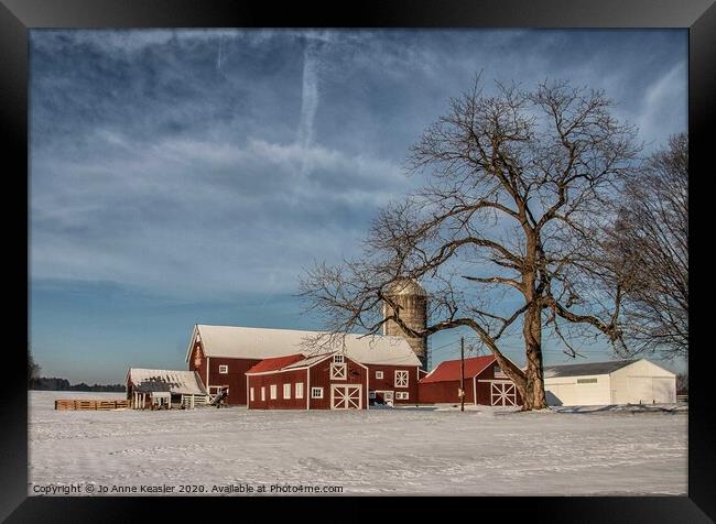 Red barn in the snow Framed Print by Jo Anne Keasler