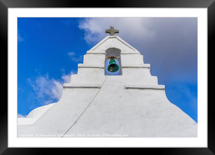Bell tower at a Greek island against blue sky. Framed Mounted Print by Theocharis Charitonidis