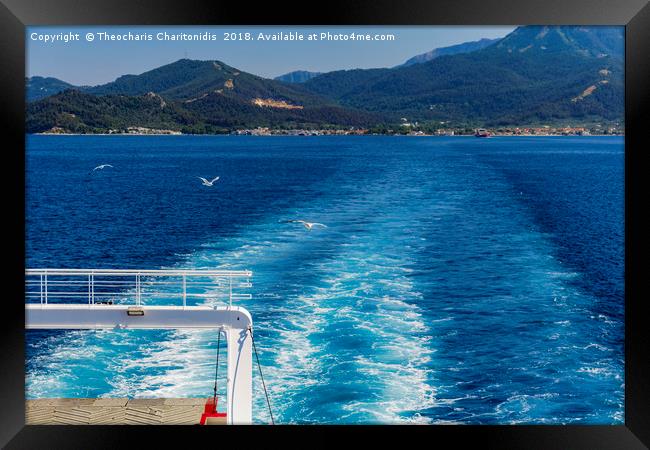 Cart Ferry sailing with seagulls flying along. Framed Print by Theocharis Charitonidis