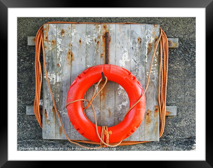 life buoy on a weathered wooden board with faded o Framed Mounted Print by Philip Openshaw