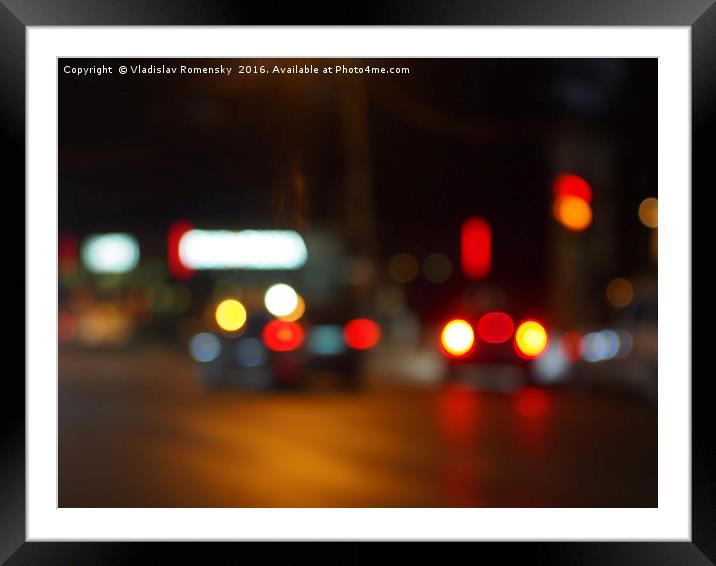 Defocused red and yellow lights on the night the t Framed Mounted Print by Vladislav Romensky