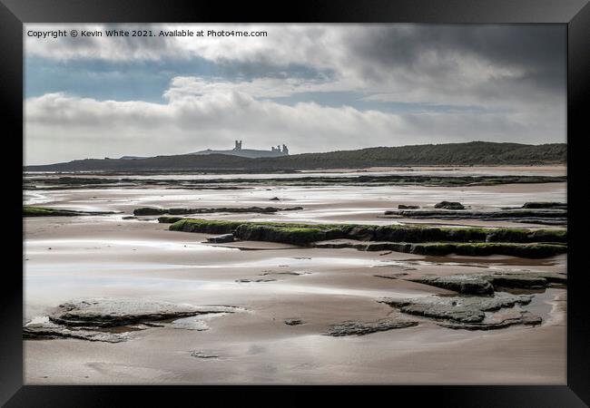 Dunstanburgh castle from Embleton beach Framed Print by Kevin White