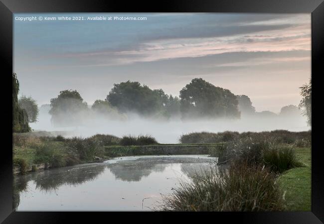 Pond bridge in morning mist Framed Print by Kevin White