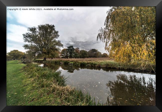 rain clouds gathering over Bushy Park Framed Print by Kevin White