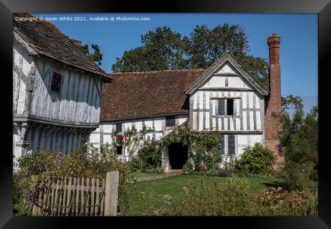 Old English crooked building still standing Framed Print by Kevin White