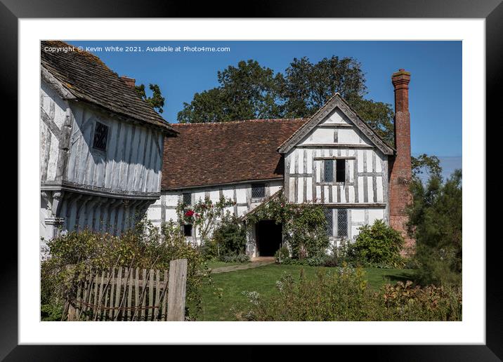 Old English crooked building still standing Framed Mounted Print by Kevin White