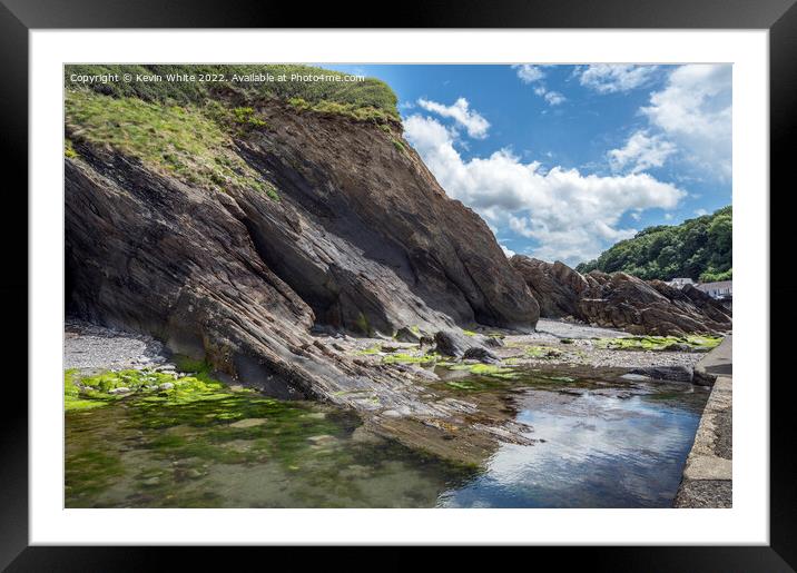 Exotic rock pools at Coombe Martin Framed Mounted Print by Kevin White
