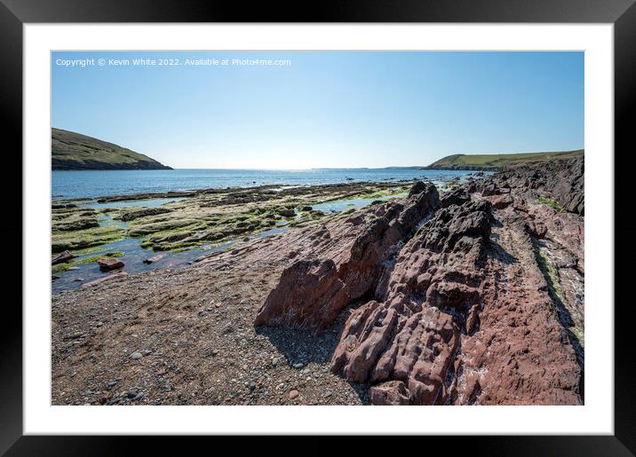 Pure blue skies over Manorbier beach in Pembrokshi Framed Mounted Print by Kevin White