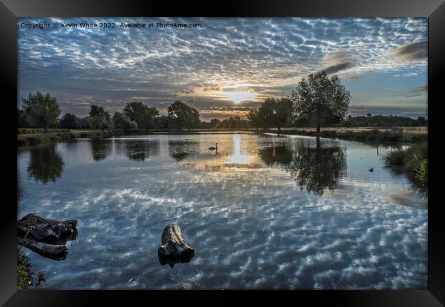 Magical reflections on sunrise Framed Print by Kevin White