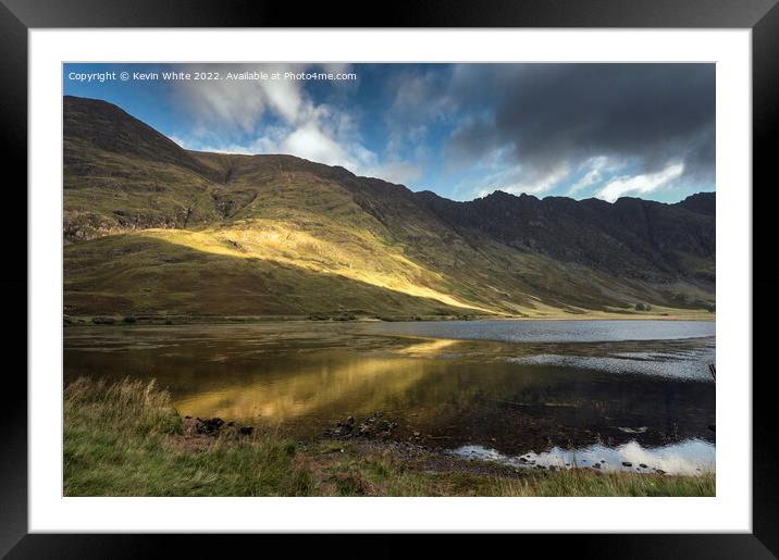 Sun breaking through the clouds Framed Mounted Print by Kevin White