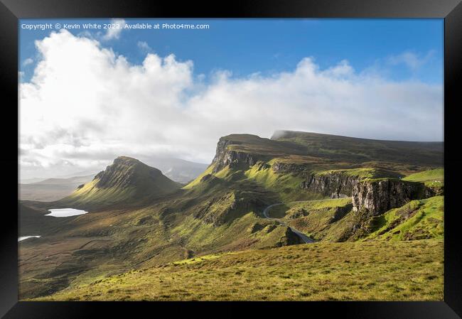 Sun breaking through over the Quiraing Framed Print by Kevin White