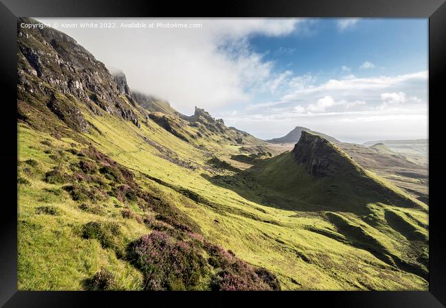 Heather growing high up on the Quiraings mountains Framed Print by Kevin White