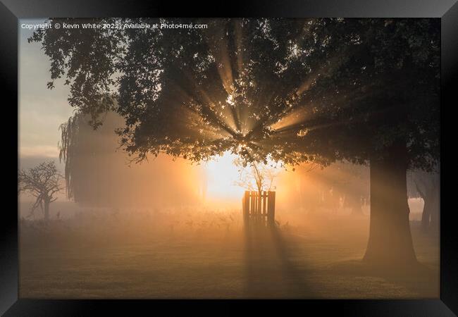 Power of the rising sun Framed Print by Kevin White