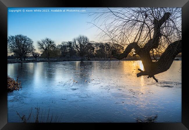 jewells of morning ice on pond Framed Print by Kevin White