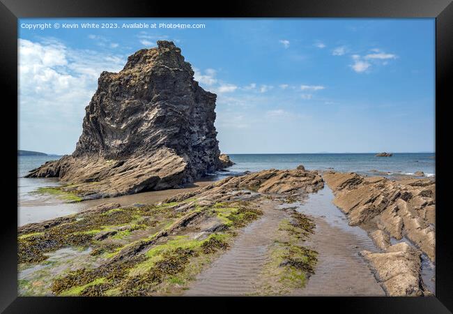 Large rock looking out to sea at Broadhaven North beach Framed Print by Kevin White