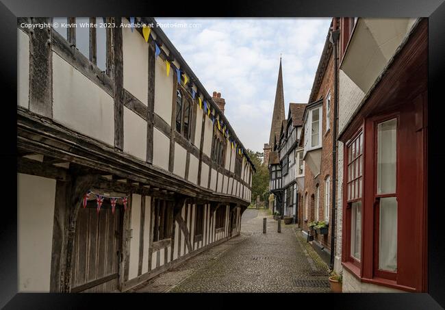 Cobbled street of Ledbury showing support with the colors of Ukr Framed Print by Kevin White