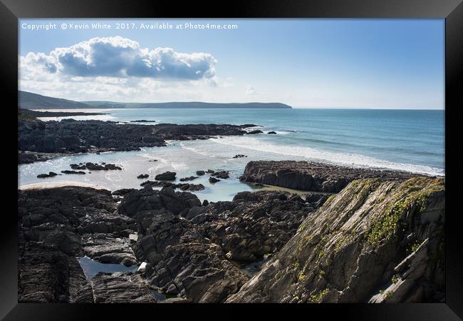 Devon rocky coastline Framed Print by Kevin White