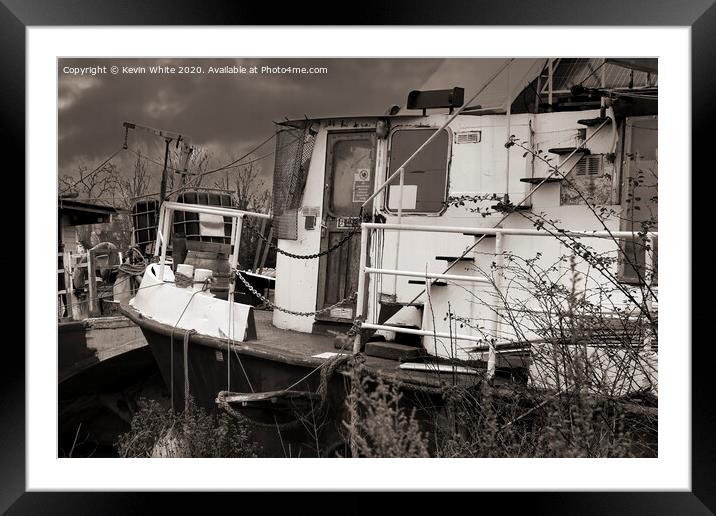 boat in need of attention Framed Mounted Print by Kevin White