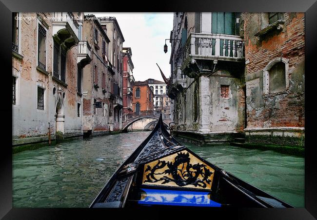Canal trip through Venice Framed Print by Kevin White