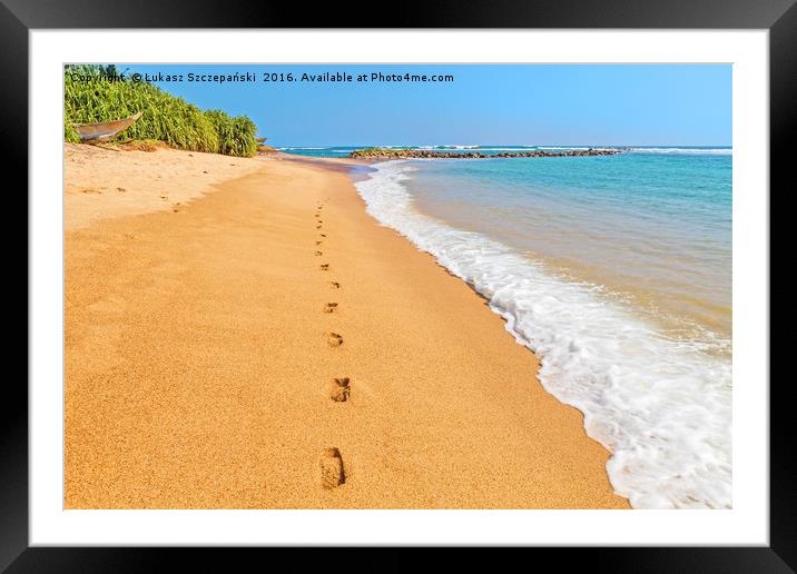 Footprints on a sandy beach by blue Indian Ocean Framed Mounted Print by Łukasz Szczepański