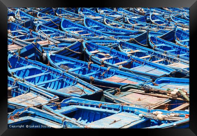 Blue old fishing boats in harbour Framed Print by Łukasz Szczepański