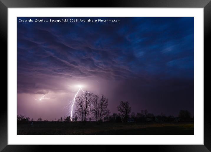 Lightning strike under dramatic cloudy sky  Framed Mounted Print by Łukasz Szczepański