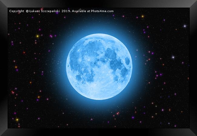 Blue super moon glowing against colorful starry sk Framed Print by Łukasz Szczepański