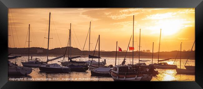 Boats in Beadnell Bay Framed Print by Gary Clarricoates