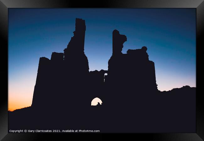 Dunstanburgh Silhouette Framed Print by Gary Clarricoates