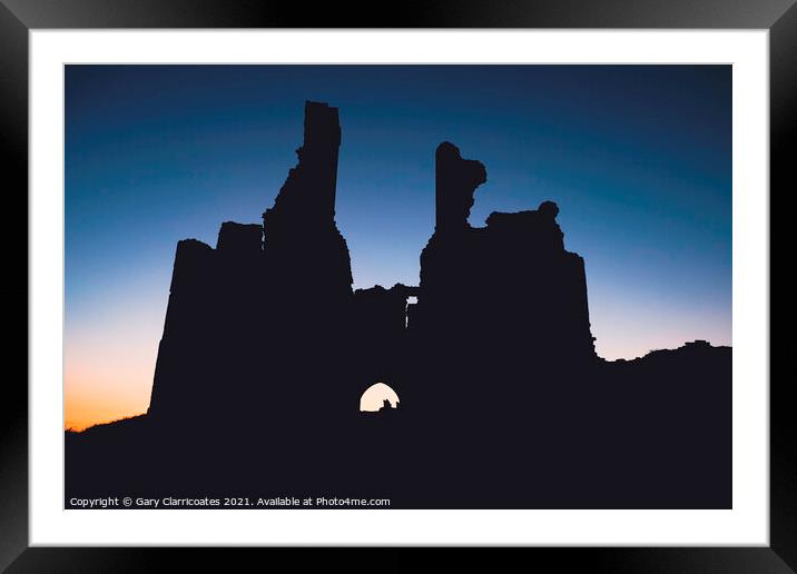Dunstanburgh Silhouette Framed Mounted Print by Gary Clarricoates