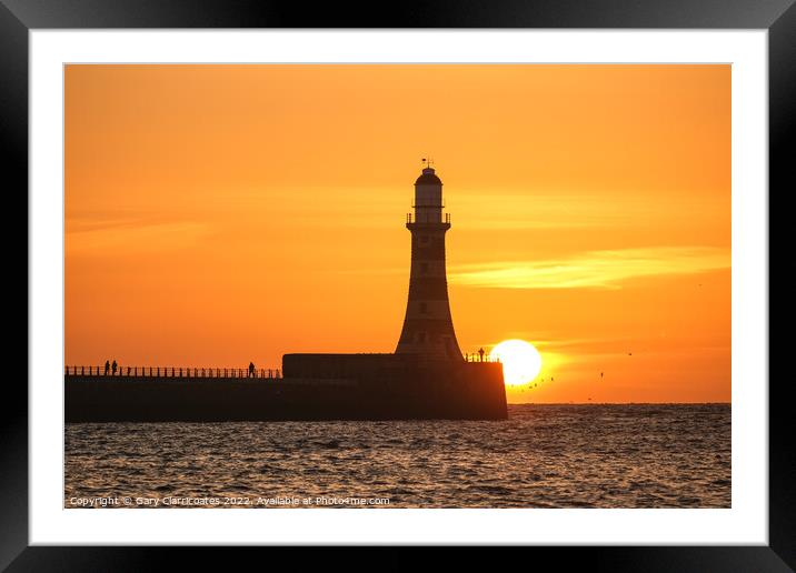 Sun Rising over Roker Framed Mounted Print by Gary Clarricoates