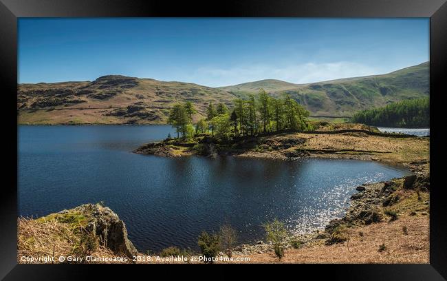 Sun over Haweswater Framed Print by Gary Clarricoates