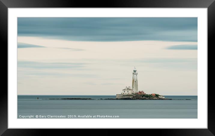 Moody Skies at St. Mary's Framed Mounted Print by Gary Clarricoates