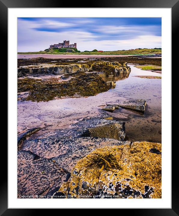 Solitude at Bamburgh Framed Mounted Print by Gary Clarricoates