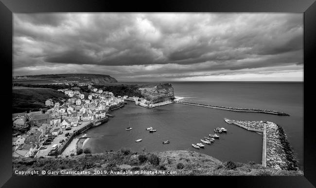 Dramatic Skies at Staithes Framed Print by Gary Clarricoates
