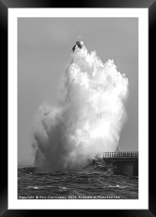 Roker lighthouse in stormy seas Framed Mounted Print by Gary Clarricoates