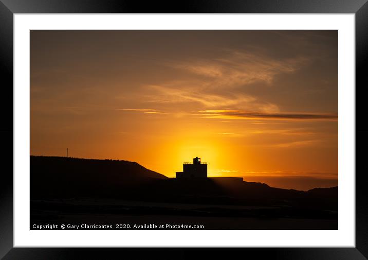 Bamburgh Lighthouse Silhouette Framed Mounted Print by Gary Clarricoates