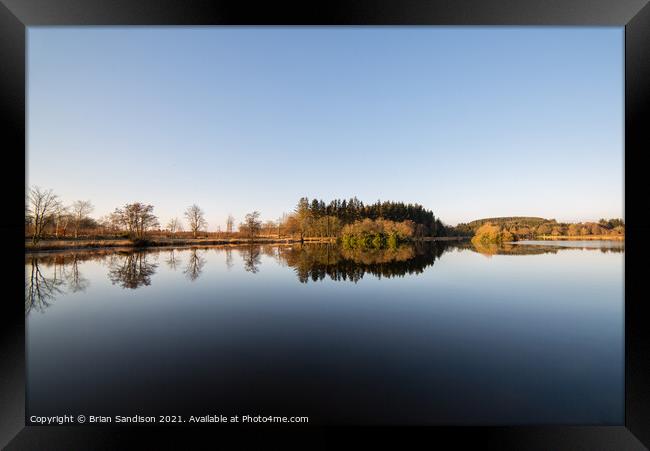 Pitfour Lake Reflections Framed Print by Brian Sandison