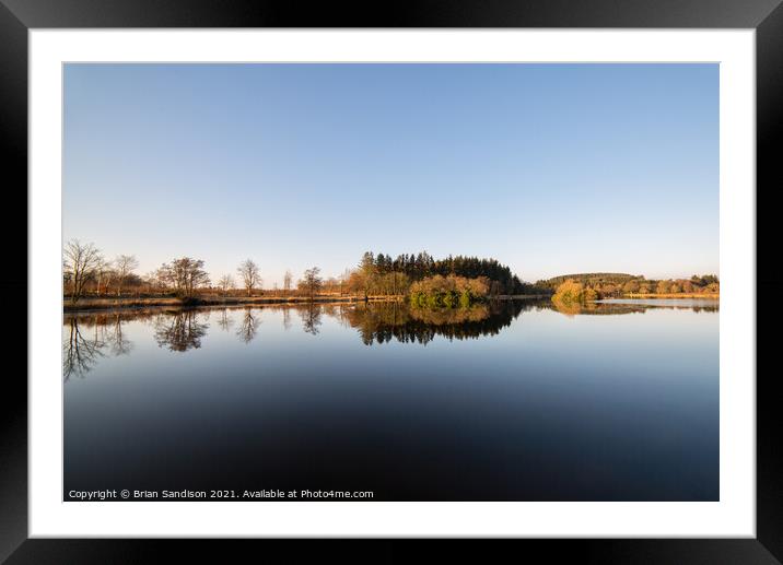 Pitfour Lake Reflections Framed Mounted Print by Brian Sandison