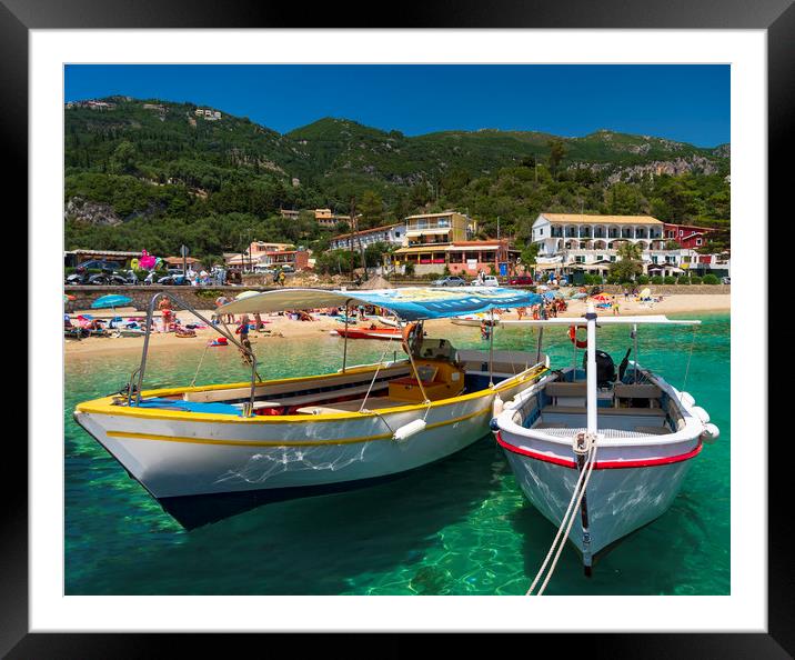 Tourists queue for boats in Palaiokastritsa, Corfu Framed Mounted Print by Alan Hill