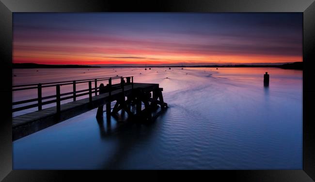 Sunset over Poole Harbour at Hamworthy pier Framed Print by Alan Hill