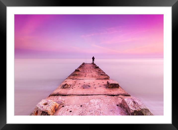 Stone jetty and calm seas Framed Mounted Print by Alan Hill