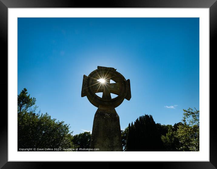 Celtic Cross with sun star burst through the upper left hand quadrant Framed Mounted Print by Dave Collins