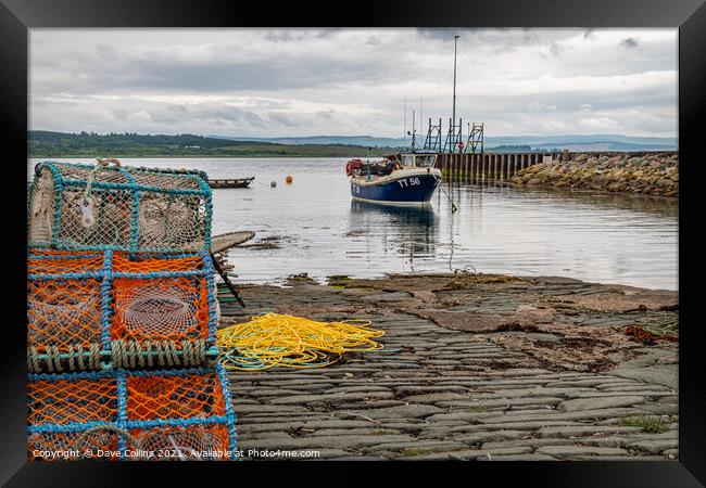 Fishing Boat in Ardrishaig Harbour with lobster pots in the foreground, Argyll and Bute, Scotland Framed Print by Dave Collins