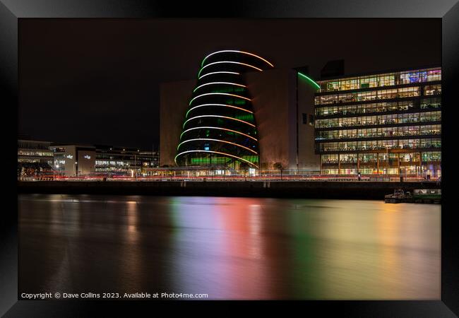 The lights of the Dublin Convention Centre reflected in the river Liffey at night Framed Print by Dave Collins