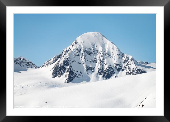 Sun and shadows on a snow covered mountain, Whittier, Alaska, USA Framed Mounted Print by Dave Collins