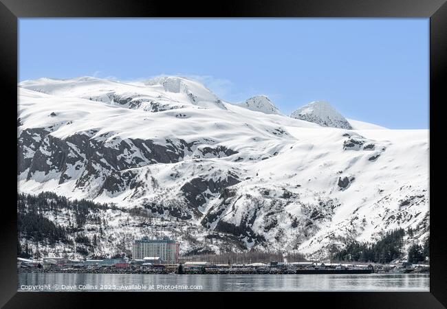 The Begich Towers Condominium building and snow covered mountains behind, Whittier, Alaska, USA Framed Print by Dave Collins