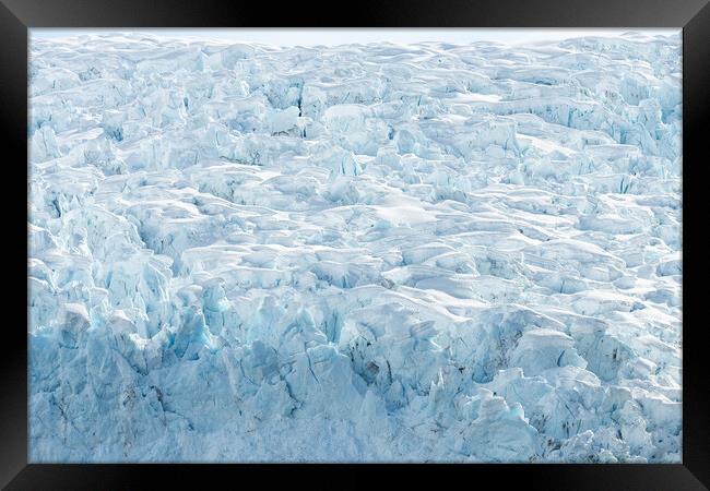 Outdoor The ice at the front of a glacier, Alaska, USA. Framed Print by Dave Collins