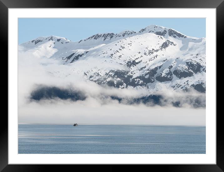 Boat approaching fog on the mountains and sea in Passage Canal, Whittier, Alaska USA Framed Mounted Print by Dave Collins