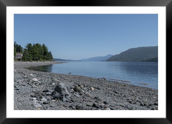 The Beach and a water front house in of Alert Bay, British Columbia, Canada Framed Mounted Print by Dave Collins